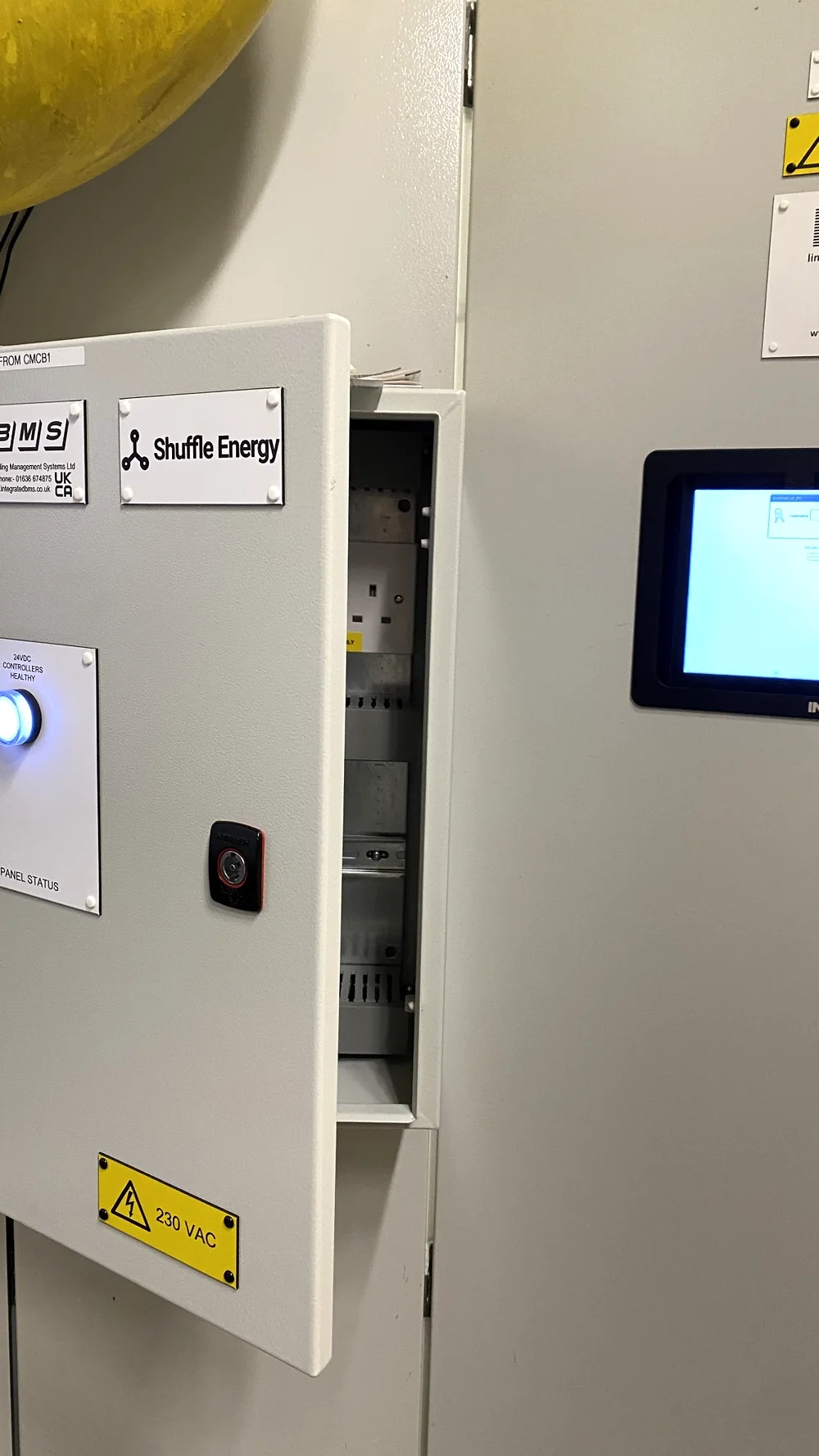 Shuffle Energy branded electrical control cabinet and installed controls